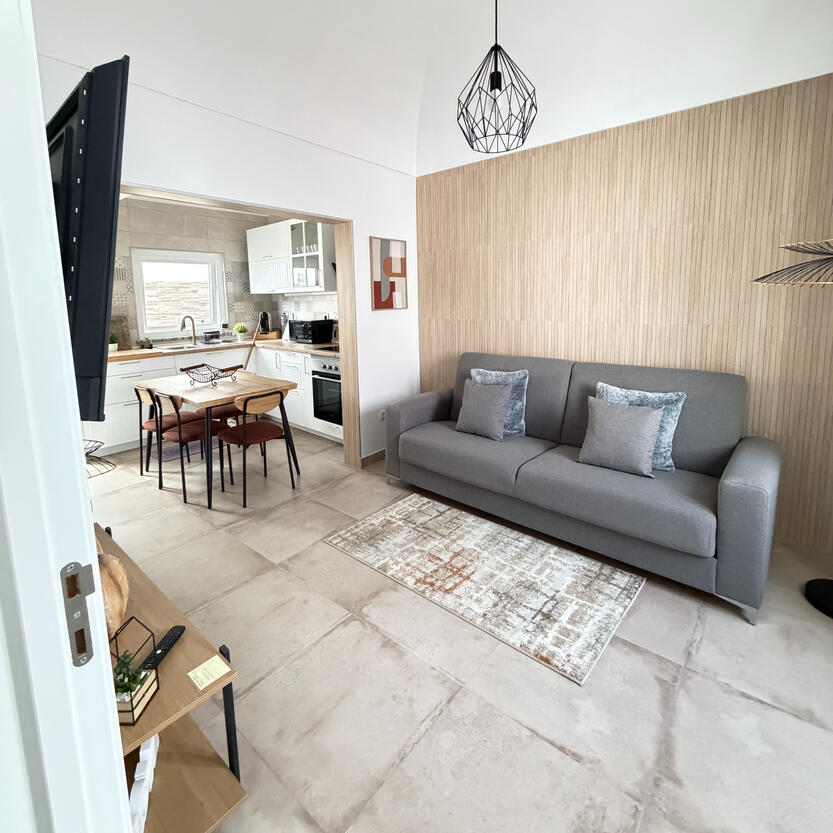 Sala com sofá cama