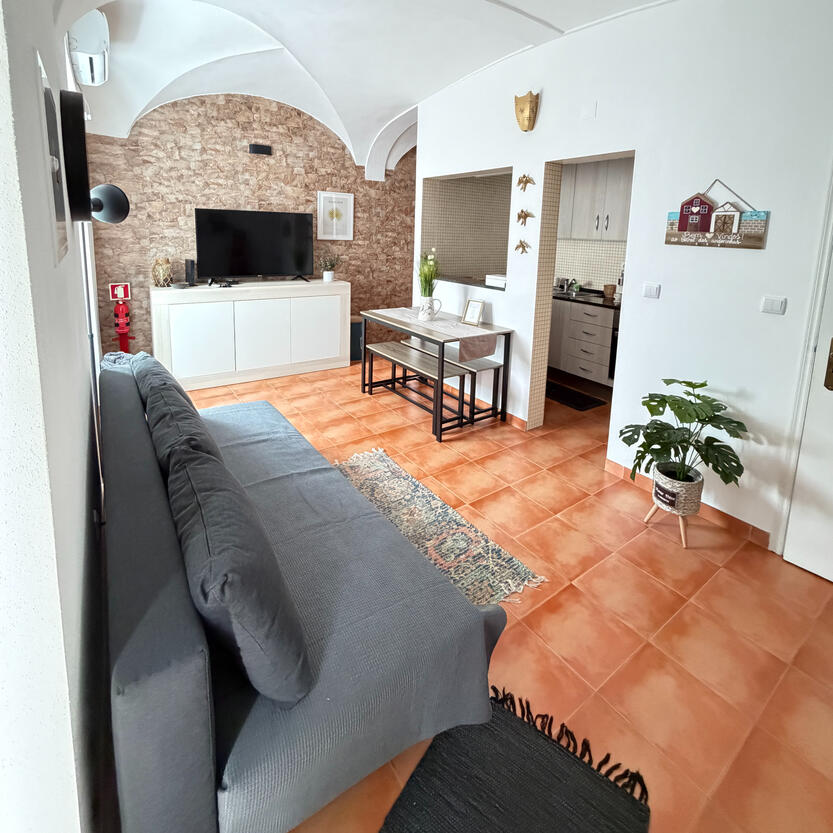 Sala com sofá cama